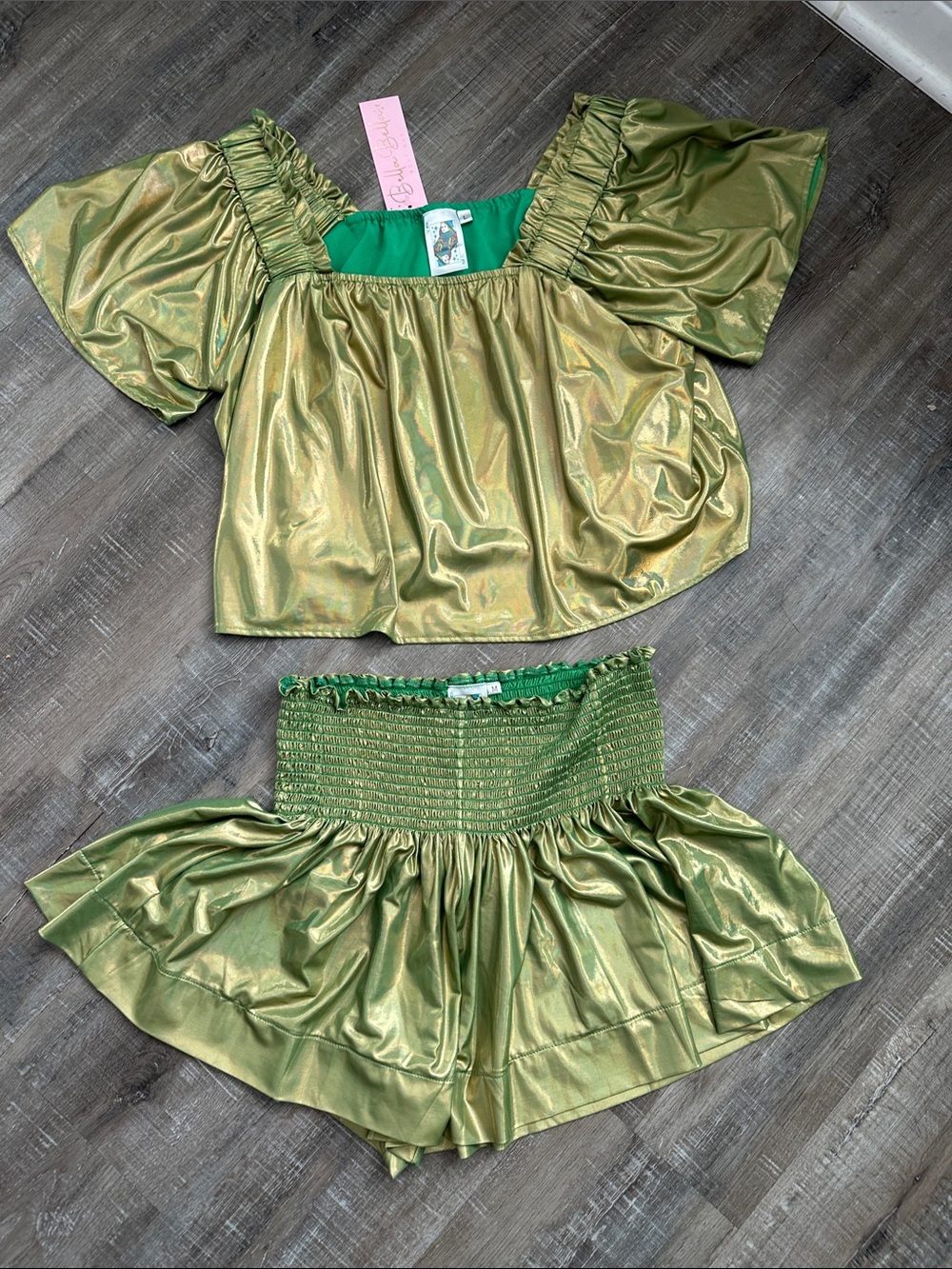 NWT Queen of Sparkles Green Metallic Set top is large shorts are medium.